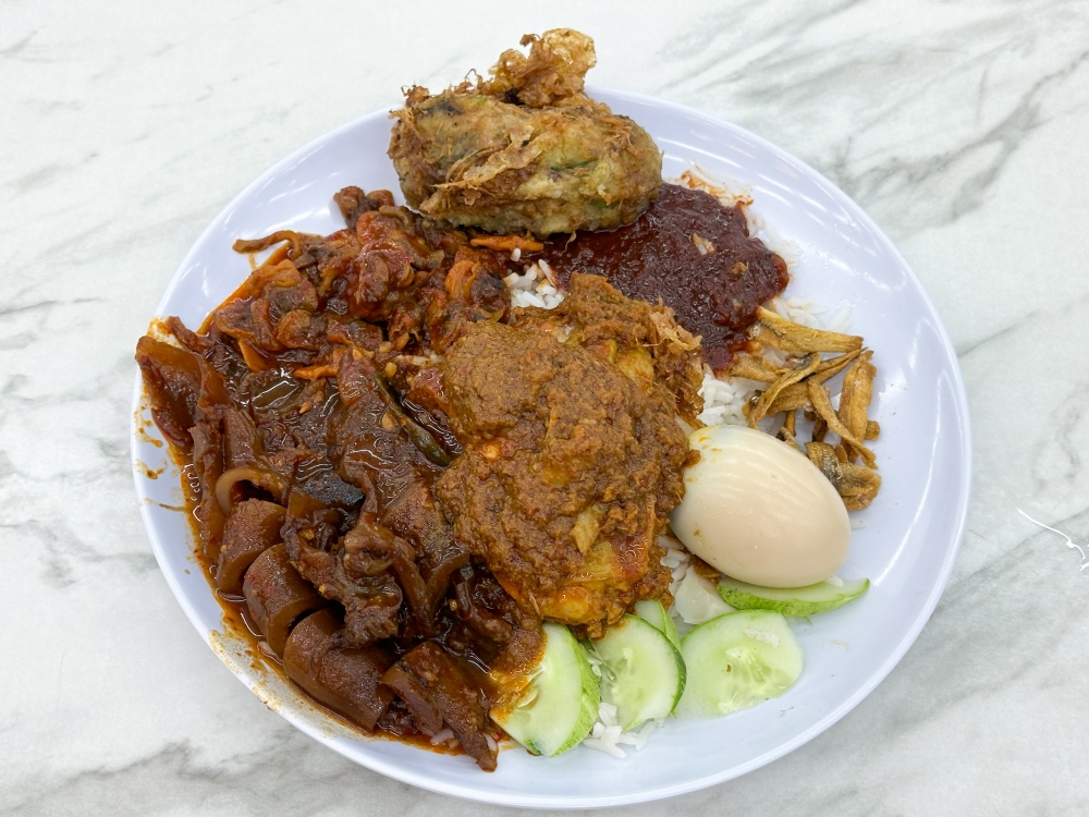 All-day cravings can be satisfied at Nasi Lemak Wanjo where the rice is super soft and the ‘sambal’ sweet-spicy.