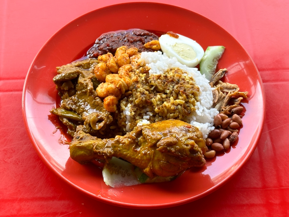 Seeking something unique? Try this ‘nasi lemak’ at Restoran Sepetang that serves wild boar curry fragrant with kaffir lime leaves and prawns sourced from Sekinchan.