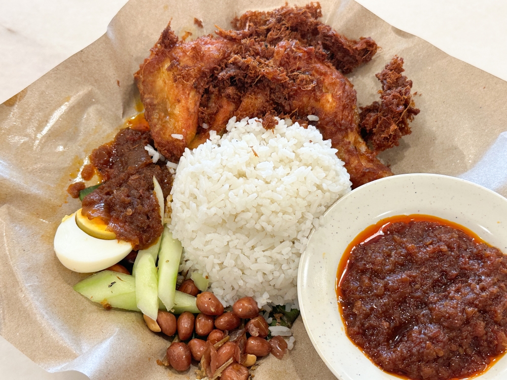 Village Park Restaurant spent a year plus perfecting their ‘nasi lemak’ with the light, fluffy rice fragrant with coconut and a thick slow cooked ‘sambal’ redolent with lemongrass.