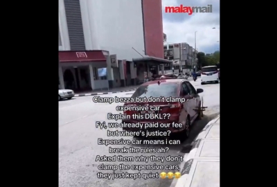 Accused of selective clamping, DBKL says only boots parked cars that don’t move after warning (VIDEO)