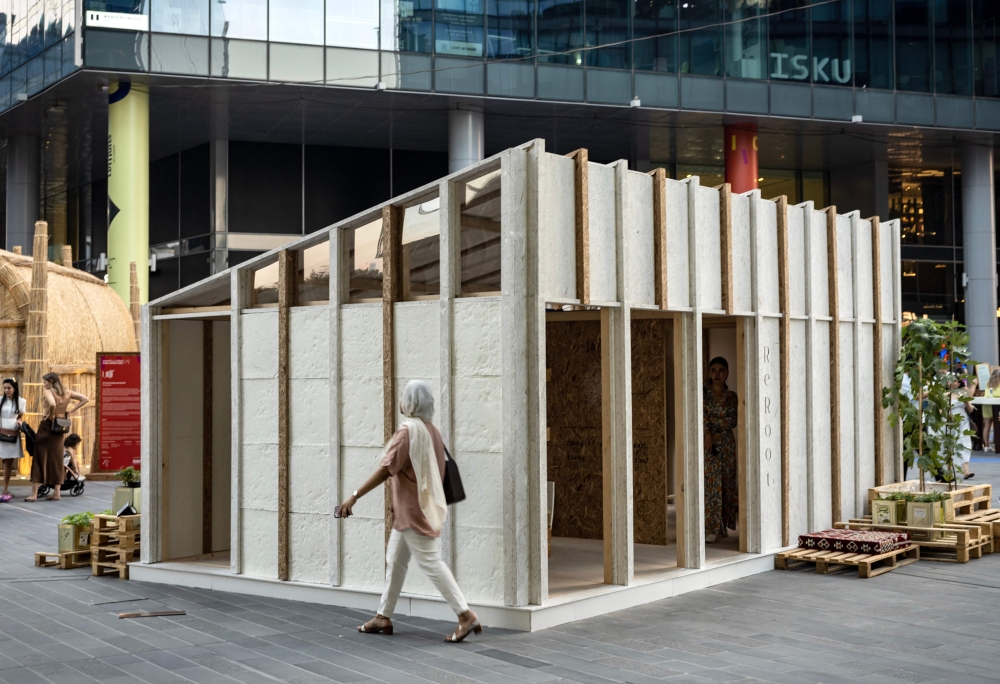 A visitor walks past a mycelium-based modular shelter, designed by the ReRoot initiative, as an alternative to the flimsy shelters now housing many thousands of Gazans displaced by more than a year of war, during the annual Design Week in Dubai on November 9, 2024. — AFP pic