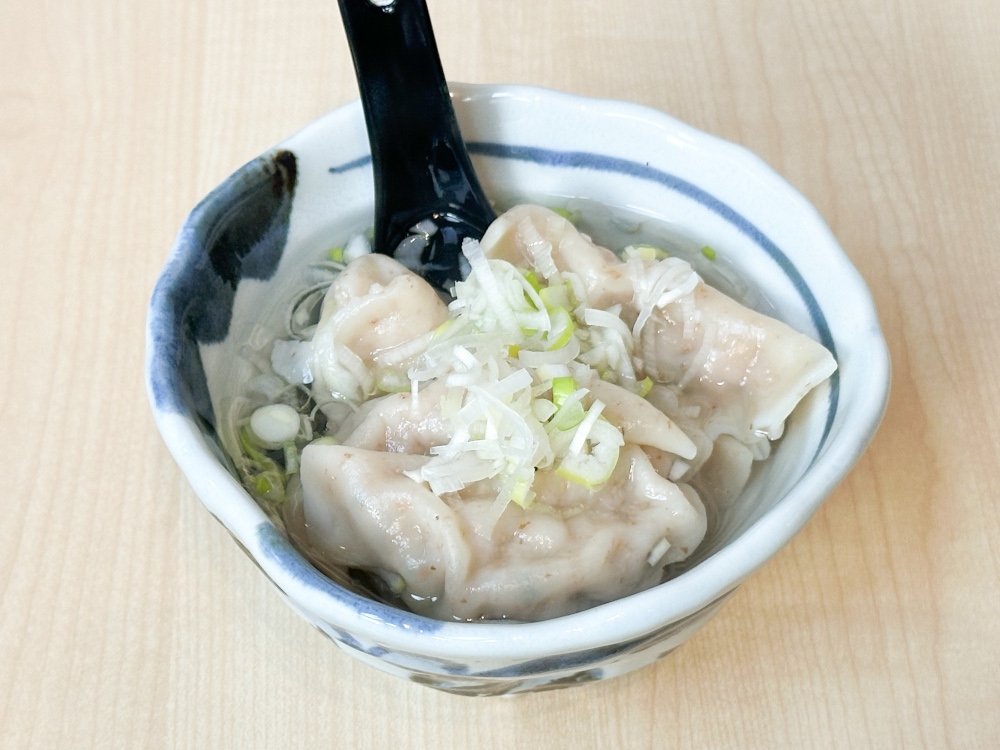 For a different texture, the Boiled Gyoza Dumplings in Soup has soft, thick skin.