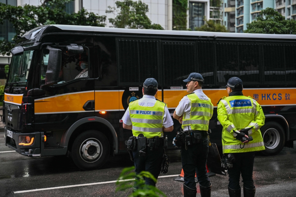 A Correctional Services van drives to the West Kowloon Magistrates' Court in Hong Kong on November 19, 2024. — AFP pic