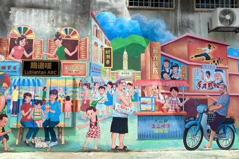 The colourful mural on the shop’s alley side wall.