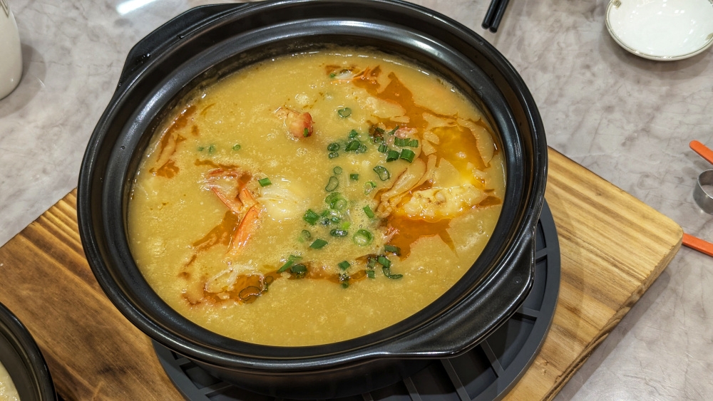 The Canadian scallop prawn porridge sports a much darker, more intense colour.