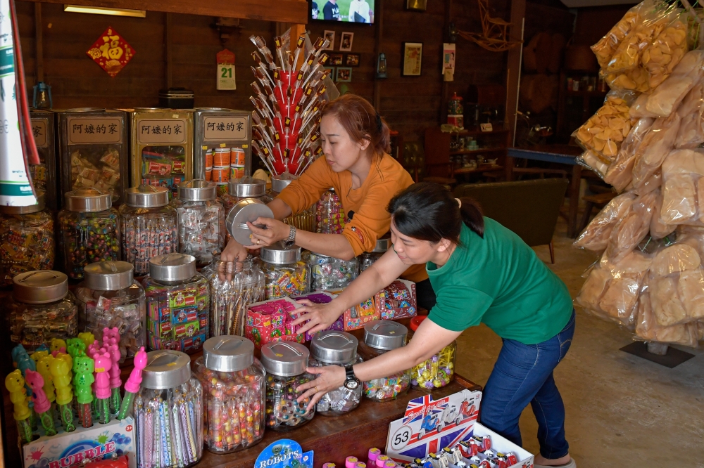 A display of nostalgic snacks that anyone growing up in the 70s will remember as being a staple in their corner shop. — Bernama pic