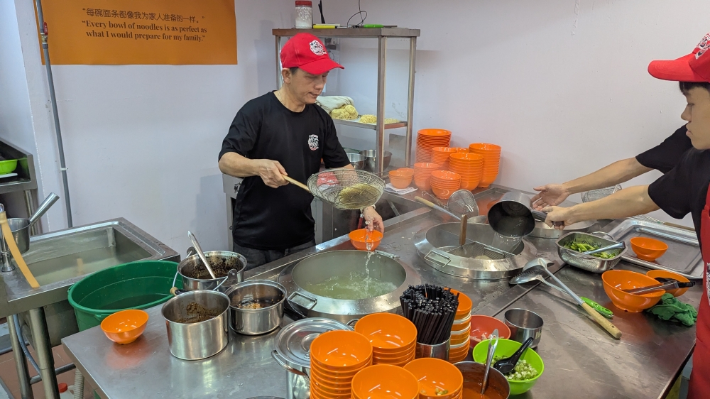 Stanley Siew now runs the business, succeeding his elder brother and father, while balancing this shop and his stall in Sea Park. — Picture by Ethan Lau