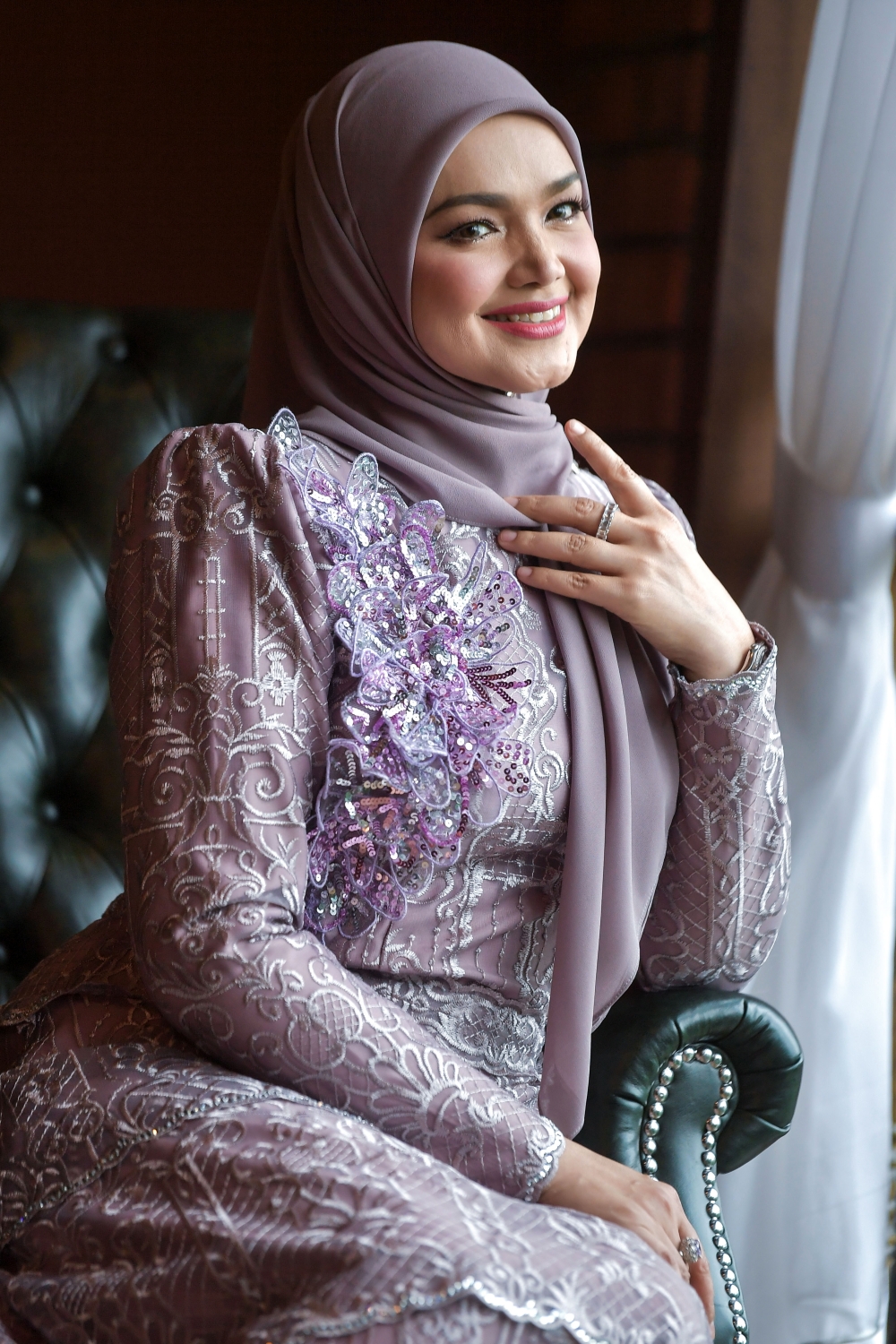 Biduanita Negara (National Songstress) Datuk Seri Siti Nurhaliza poses for a picture during the appreciation ceremony and launch of her latest single ‘Sejarah’ at The Roomah Solaris. — Bernama pic 