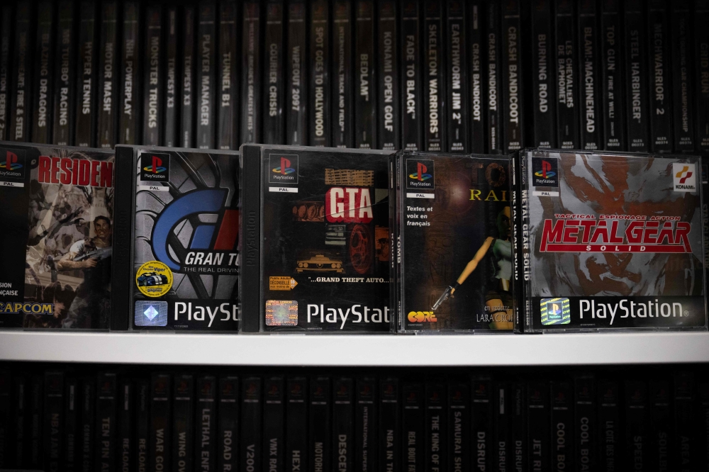 This photograph shows PlayStation 1 games on a shelf, in Vraiville, northern France, on November 20, 2024. A global success, particularly with a more adult audience, which has propelled the Japanese manufacturer to the rank of major player in the sector. — AFP pic