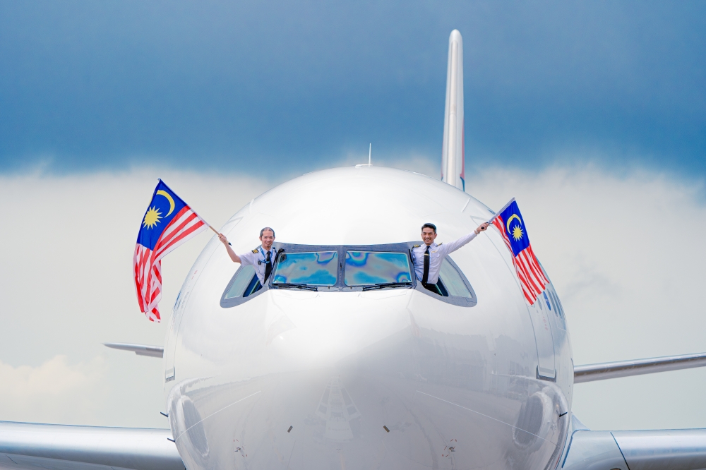 The crew who flew Malaysia Airlines’ new Airbus A330neo from the Airbus Delivery Centre in Toulouse, France to Kuala Lumpur International Airport (KLIA) are seen from the cockpit. — Picture courtesy of Malaysia Aviation Group Berhad