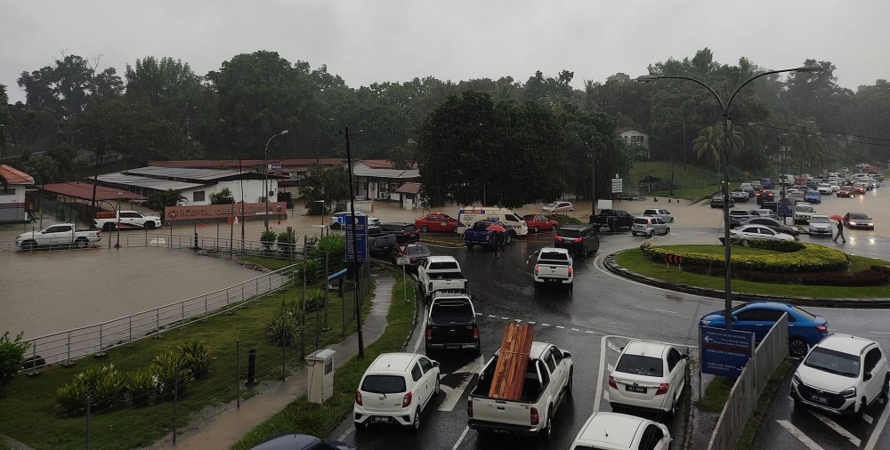 The Queen Elizabeth Hospital among the areas affected by the flash floods. — Picture from social media