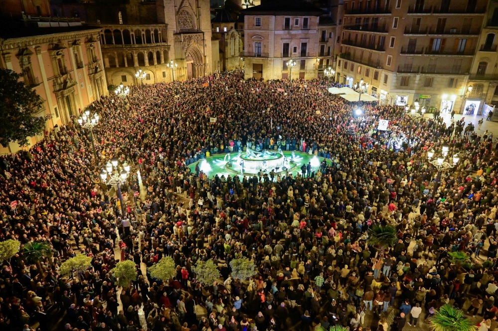 An estimated 100,000 people gather to protest the regional government's response and call for the resignation of Valencia regional president Carlos Mazon, a month after devastating floods in Valencia, eastern Spain, on November 30, 2024. — AFP pic