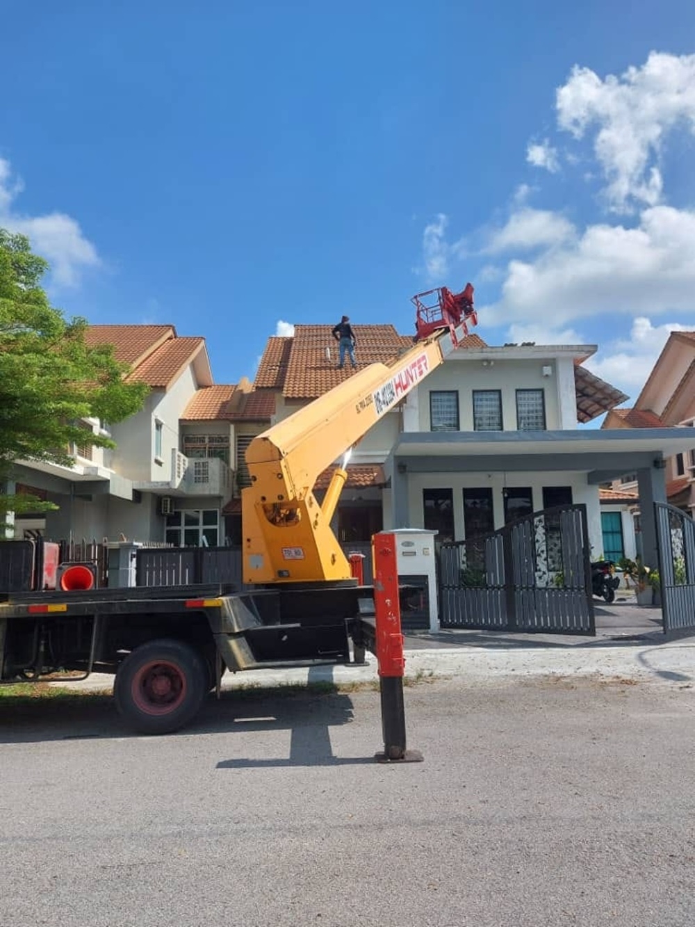 Solar panels being installed with the help of a crane and a team of two to three workers, starting in the morning and working until night. — Picture via Facebook/Abdul Wahid Ibrahim