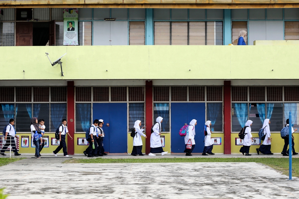 If students were taught to love their subjects and enjoy learning as a whole, the assessment method itself will be (almost) secondary, according to the author. — Picture by Yusof Mat Isa