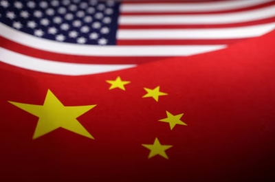 US warns China, travel advisory down for now but future detentions of Americans could trigger higher alerts again