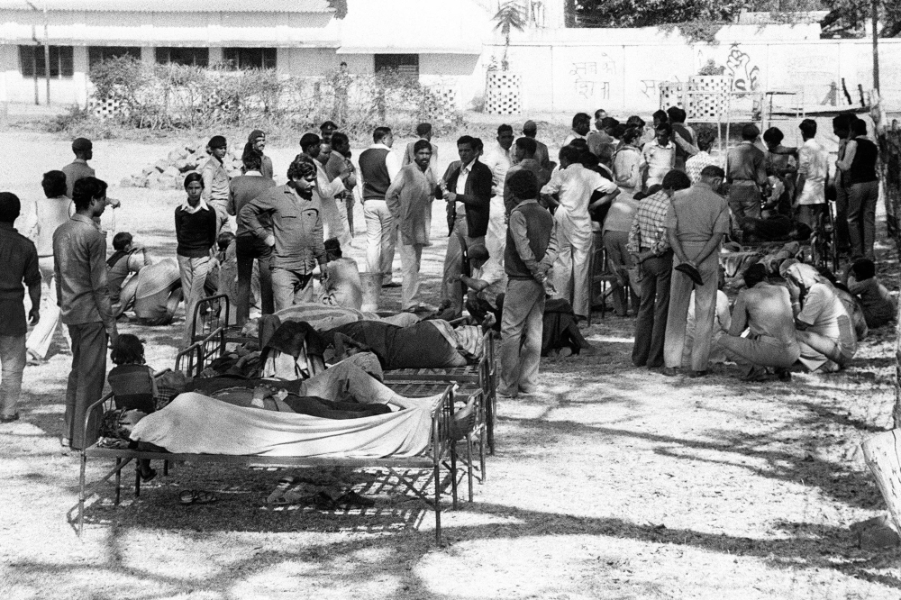 Gas leak disaster victims wait to be treated at a hospital in Bhopal on December 4, 1984. Just after midnight, as poisonous plumes of smoke wafted through the Indian city of Bhopal four decades ago, residents ran to escape the cloud of highly toxic gas leaking from the Union Carbide factory on the night of December 2, 1984. — AFP pic