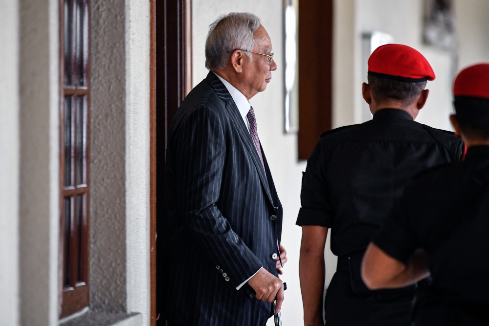 Najib exiting the courtroom where his 1MDB trial is being held on December 5, 2024. — Bernama pic