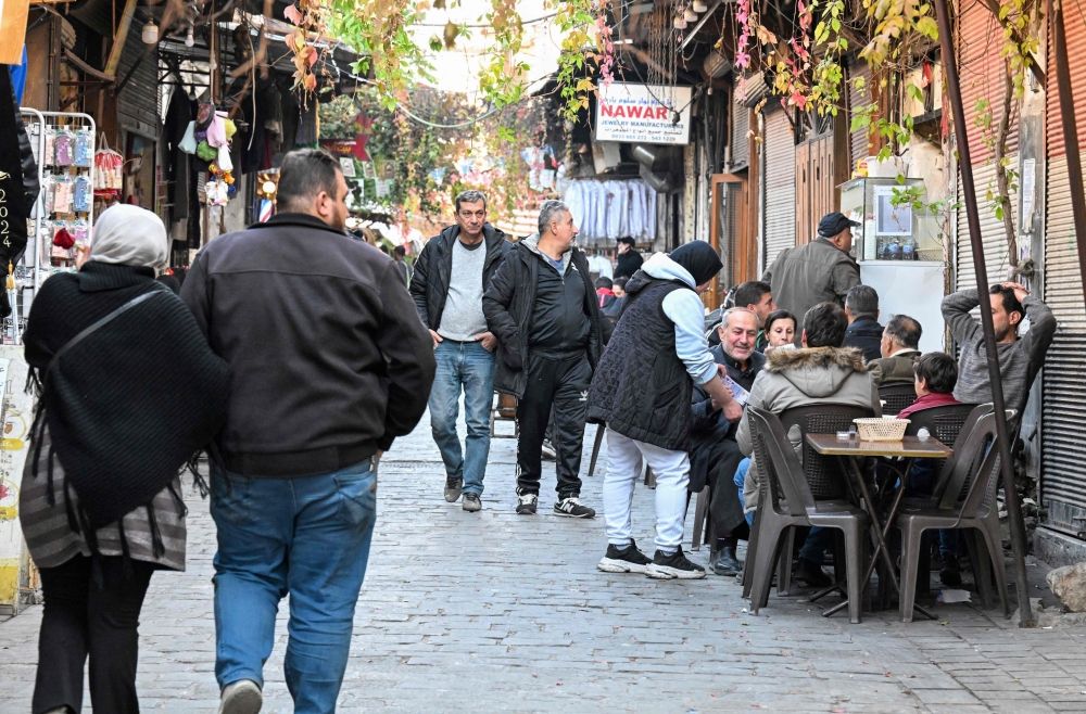 A day out as usual in the old city of Damascus on December 6, 2024.  — AFP pic