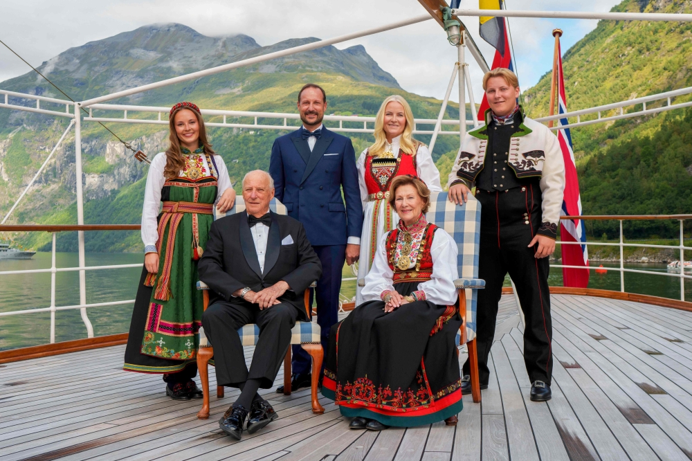 (From left, front) Norway’s King Harald V, Norway’s Queen Sonja, (from left, back) Norway’s Princess Ingrid Alexandra, Norway’s Crown Prince Haakon, Norway’s Crown Princess Mette-Marit and Norway’s Prince Sverre Magnus pose for a group photo aboard the kingship Norway in the Geirangerfjord on August 31, 2024, where they attend Princess Martha Louise of Norway and her future husband Durek Verrett’s wedding. — Cornelius Poppe/AFP pic