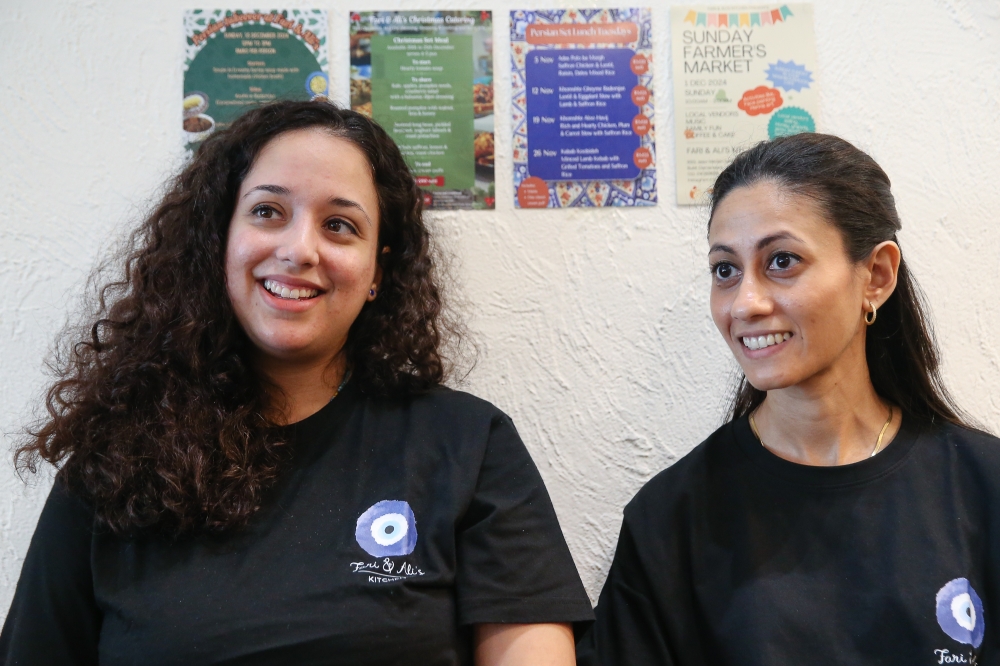 Sharifah Samira Syed Anwar, 32 (left) and Sharifah Athirah Syed Azmi, 34, founders of Fari and Ali’s Kitchen. — Picture by Yusof Mat Isa