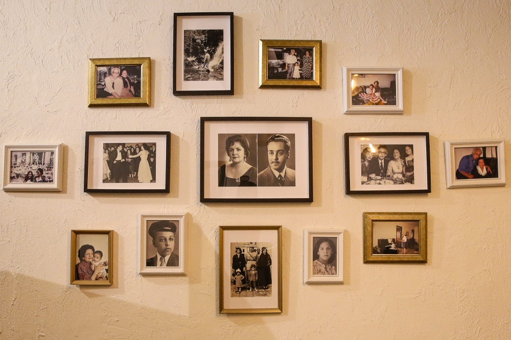 A feature wall at Fari and Ali’s Kitchen is dedicated to nostalgic photos of Samira’s grandparents. — Picture by Yusof Mat Isa  