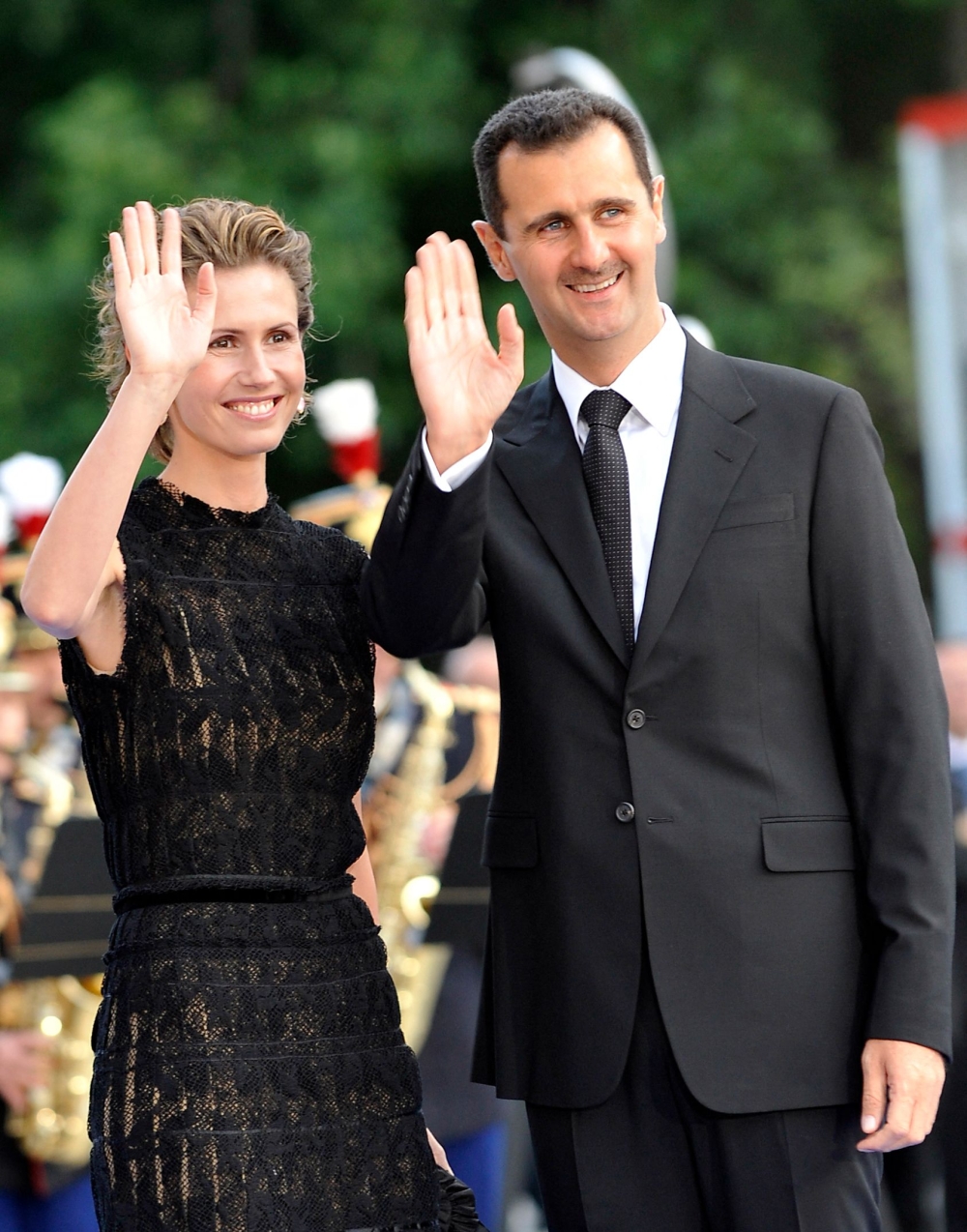 Syria’s former President Bashar al-Assad and his wife Asma during an event on July 13, 2008 in Paris. — AFP file pic