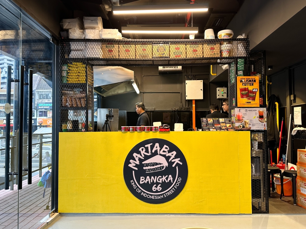 Inside the eatery, cooking is done behind the counter.