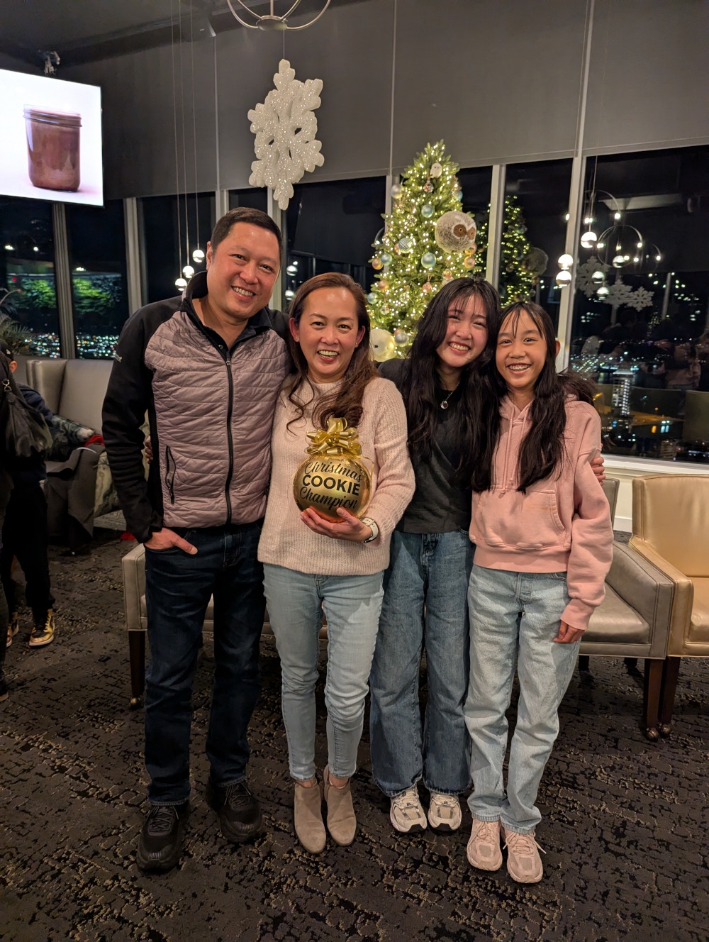 Janet Tan (second from left) with her family during a watch party when the episode aired. — Picture courtesy of Janet Tan 