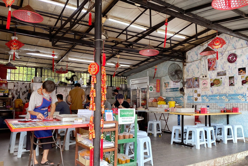 The shop is decorated with tiny red ‘nón tơi’ or Vietnamese conical hats. — Picture by CK Lim