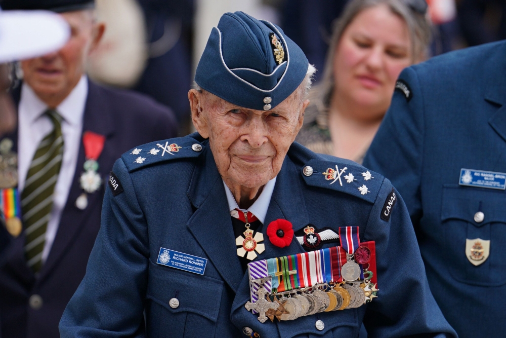 Canada’s most decorated military veteran, 100-year-old Major-General Richard Rohmer attends the International commemorative ceremony at Omaha Beach, Saint Laurent sur Mer, Normandy on the northern coast of France, as part of the events to mark the 80th anniversary commemorations of Allied amphibious landing (D-Day Landings) in France in 1944, on June 6, 2024. Still an avid news consumer and writer, Rohmer told AFP that remarks by President-elect Donald Trump implying that Canada could be absorbed by the United States should not be laughed off. — Jordan Pettitt/Pool/AFP pic 