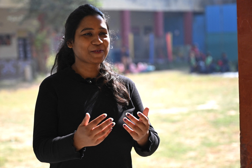 Language teacher Vandana Pandey speaks during an interview with AFP at a school in New Delhi on December 3, 2024. India boasted one of the liveliest startup scenes in the sector during the pandemic, including a firm called BYJU’s which was once the most valuable Ed Tech startup in the world. — AFP pic