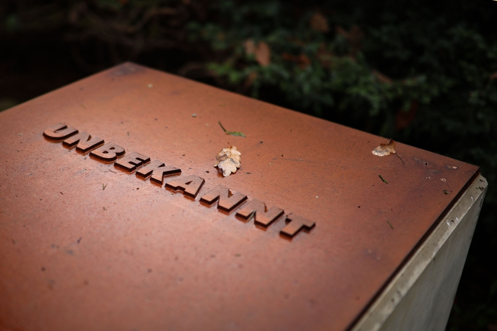 ‘Unknown’ is written on a plaque at a mass grave at the ‘Langenstein-Zwieberge Concentration Camp Memorial’ on November 7, 2024 near Halberstadt, eastern Germany. — AFP pic