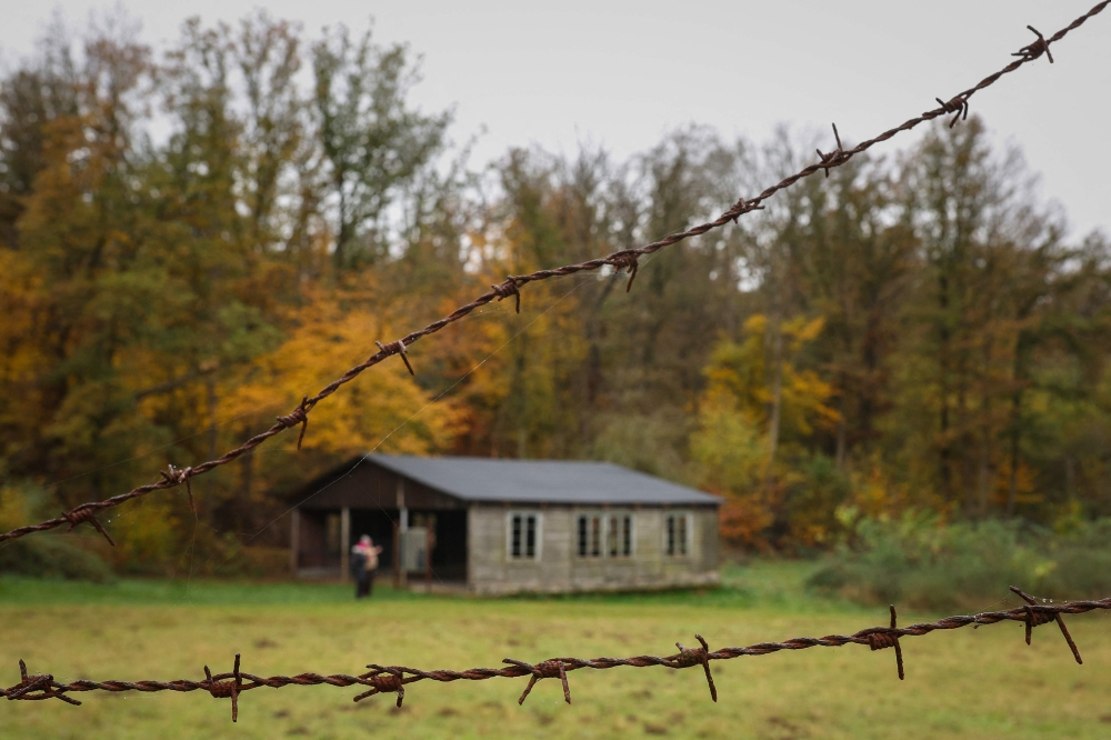 A former prisoner barrack (Barrack 13) and a barbed wire fence can be seen at the ‘Langenstein-Zwieberge Concentration Camp Memorial’ on November 7, 2024 near Halberstadt, eastern Germany. — AFP pic