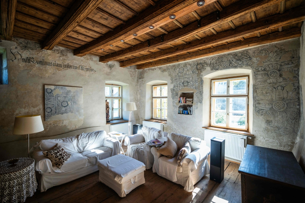 View of Carmen Schuster's Guesthouse with original restored wall decorations in Cincsor, a small Transylvanian village some 250km North-West of Bucharest, Romania, on October 17, 2024. — AFP pic