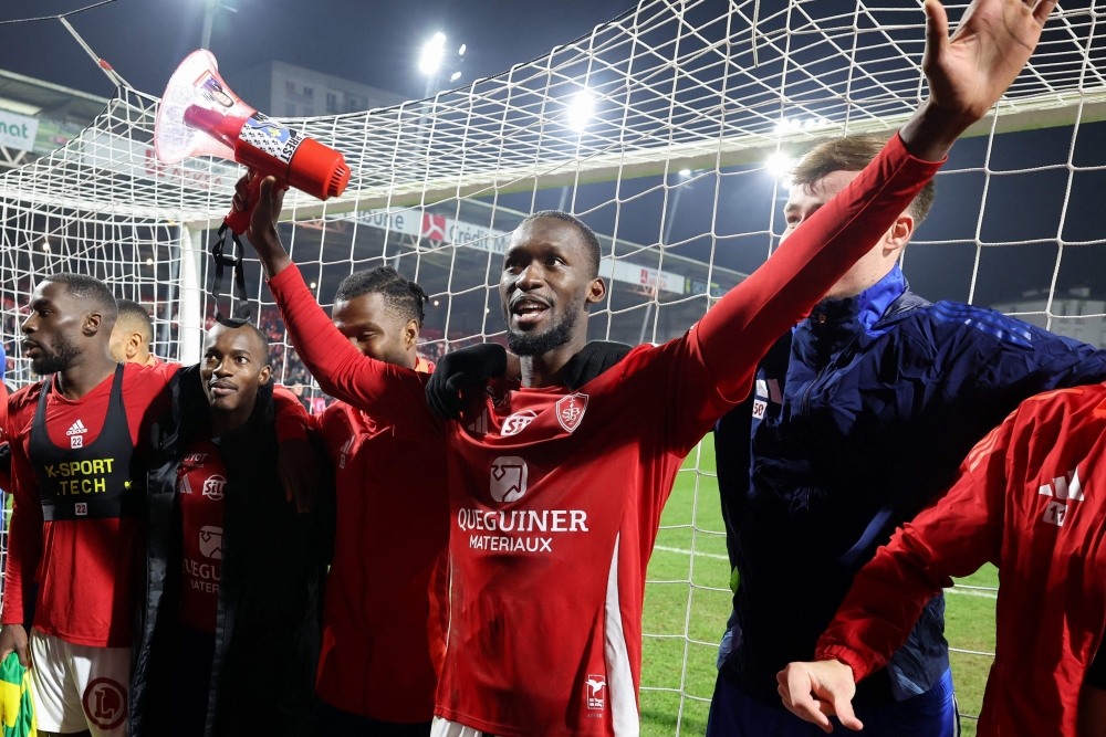 Brest's Senegalese forward Abdallah Sima (centre) celebrates at the end of the French L1 football match withNantes at Stade Francis-Le Ble in Brest, western France, on December 15, 2024. — AFP pic