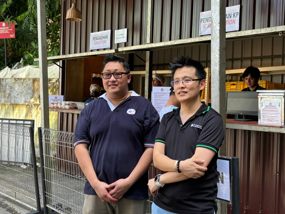 Sabah Chef Association president Adrian Chong (left) and Jetsin Sdn Bhd managing director Datuk Koh Chung Jade joined forces to bring this project to life. — Picture by Julia Chan