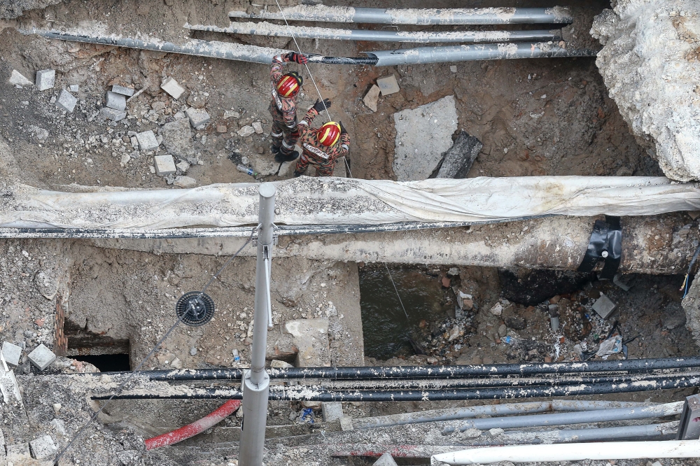 Another shocking incident this year that gripped the nation was the disappearance of an Indian national who fell into an eight-metre-deep sinkhole while walking on the sidewalk of Jalan Masjid India, in the heart of the capital, at 8.20am on August 23.— Picture by Sayuti Zainudin 