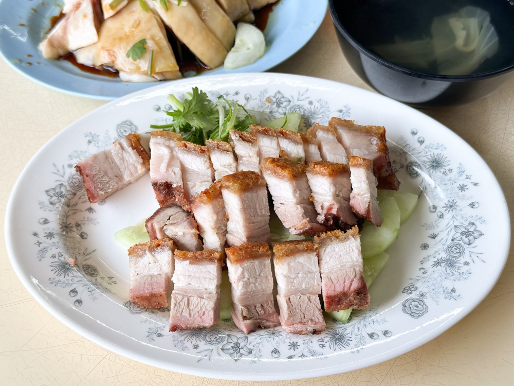 Gerai Makanan Kie Kee's secret weapon is their roast pork, only known to their regulars. — Picture by Lee Khang Yi