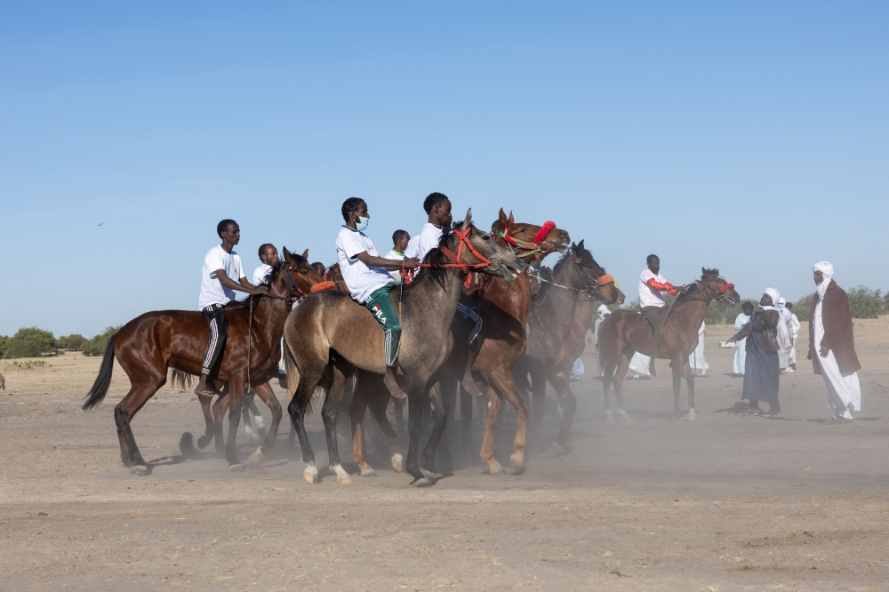 Jockeys are positioned on the starting line ahead of the first horse race of the season at the Biligoni racecourse in Chad on November 30, 2024. — AFP pic 