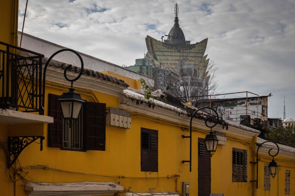 This photo taken on December 13, 2024 shows a view of the Grand Lisboa Casino from the Portuguese colonial neighbourhood of S. Lazaro in Macau. — AFP pic 