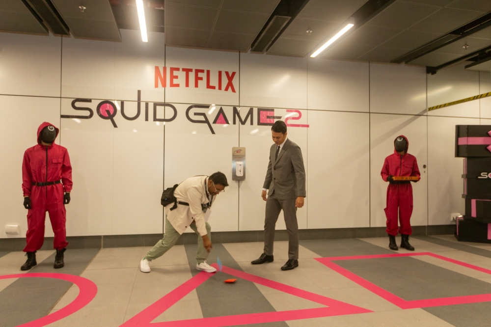 In conjunction with the second season of Squid Game, MRT Corp has collaborated with Netlix to transform the Ampang Park MRT Station into the world of Squid Game. — Picture by Raymond Manuel