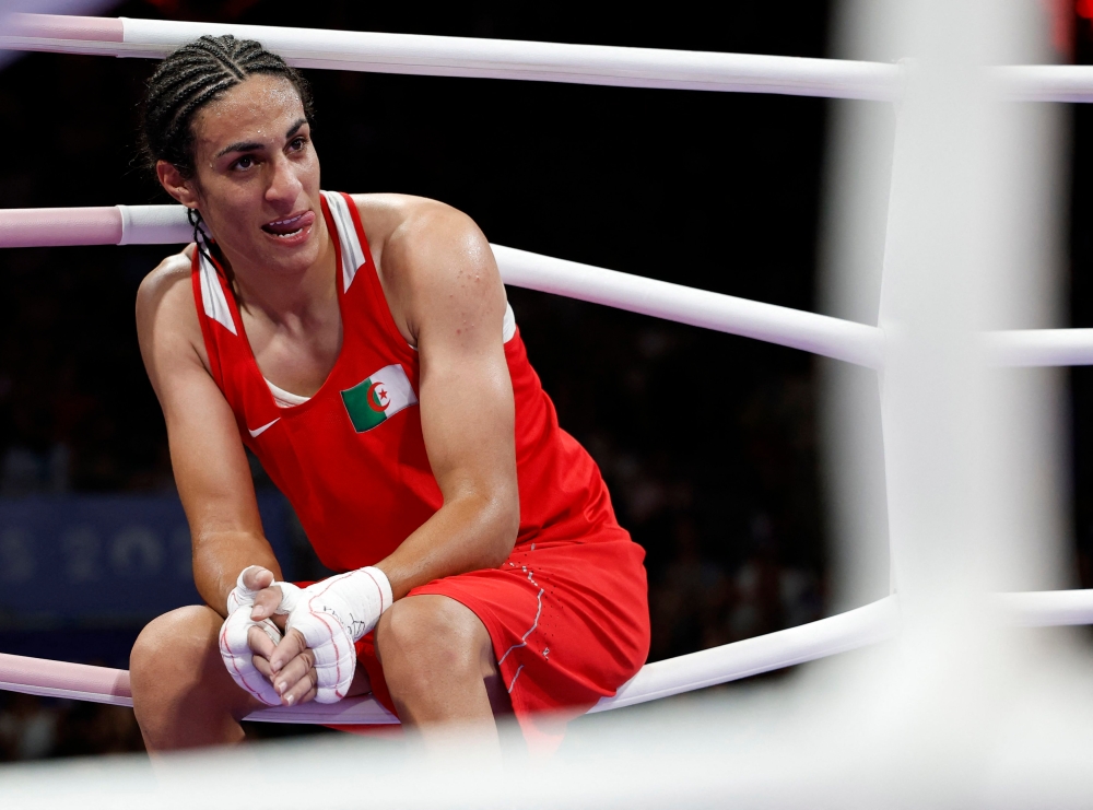 With braided hair and a powerful 1.79 metre physique, Imane Khelif was the object of a Paris Olympic Games gender controversy. — Reuters pic