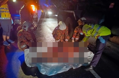 Sarawak motorcyclist found pinned under lorry’s tyre after fatal crash in Song