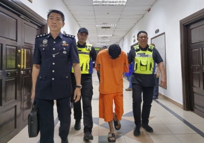 Kuching court extends remand to Dec 29 for Harimau Malaya fan who admitted to killing woman to fund expenses for Asean Cup