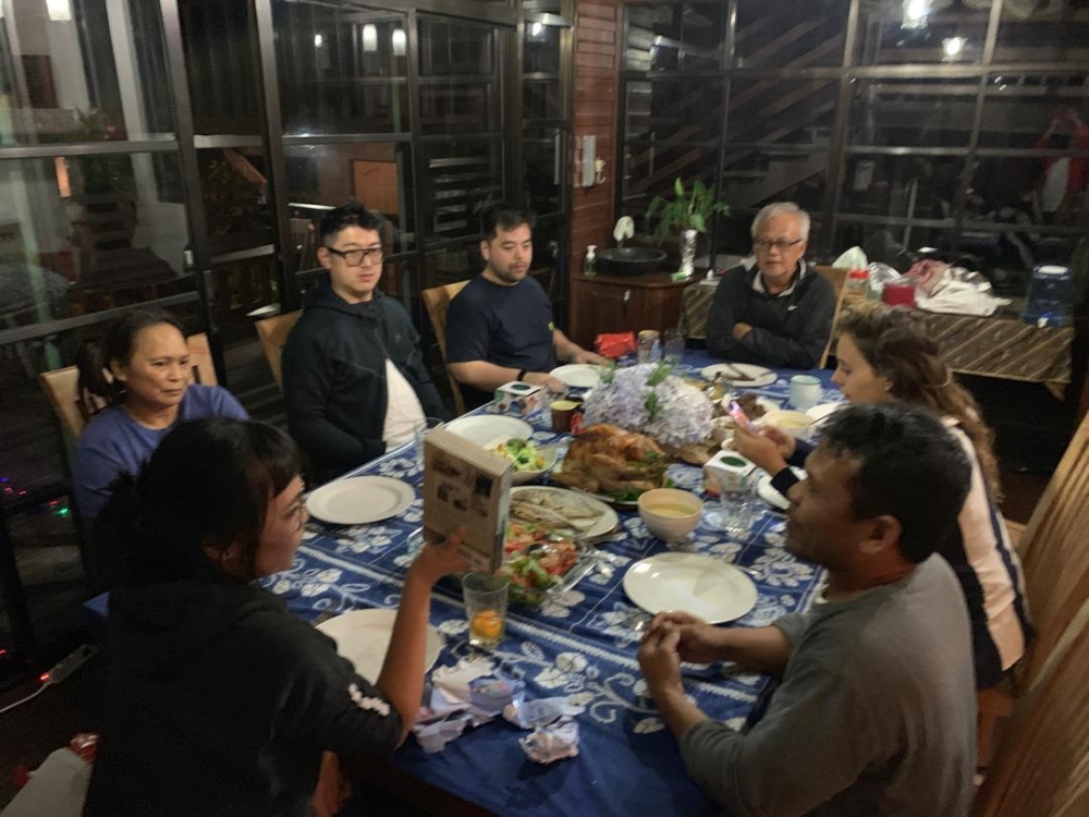 The Johan family having Christmas dinner with guests and their workers during one of their Christmas celebrations in Mesilou in Kundasang, Sabah. — Picture courtesy of Datuk Johan Arifin and Datin Fazar Arif