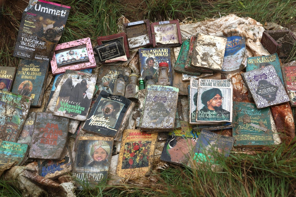 A file photograph shows Al-Arqam material seized from three houses of top GISBH executives, in Kampung Pinji September 21, 2024. — Bernama pic