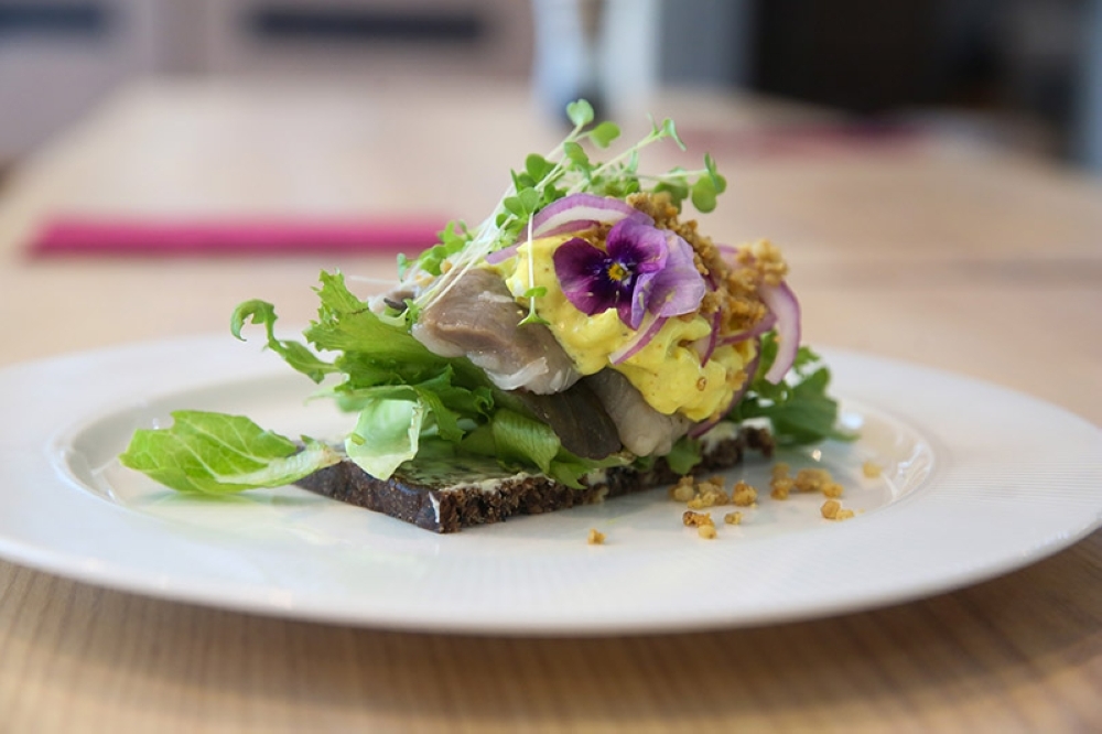 Denhygge Danish Restaurant brings us to faraway Denmark with their Marinated Herring Smørrebørd — Picture by Choo Choy May