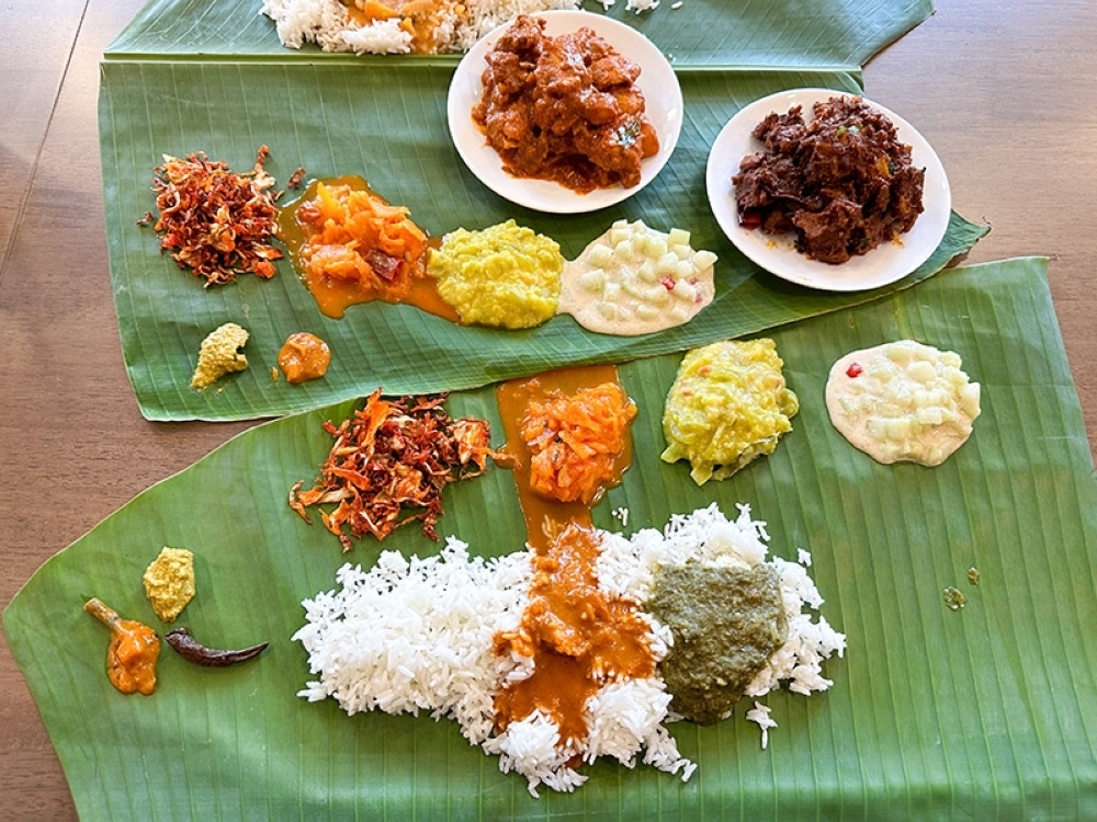 Banana leaf rice at Achi Ayahdorai is taken to a different level with its ensemble of vegetables and side dishes with home cooked flavours — Picture by Lee Khang Yi