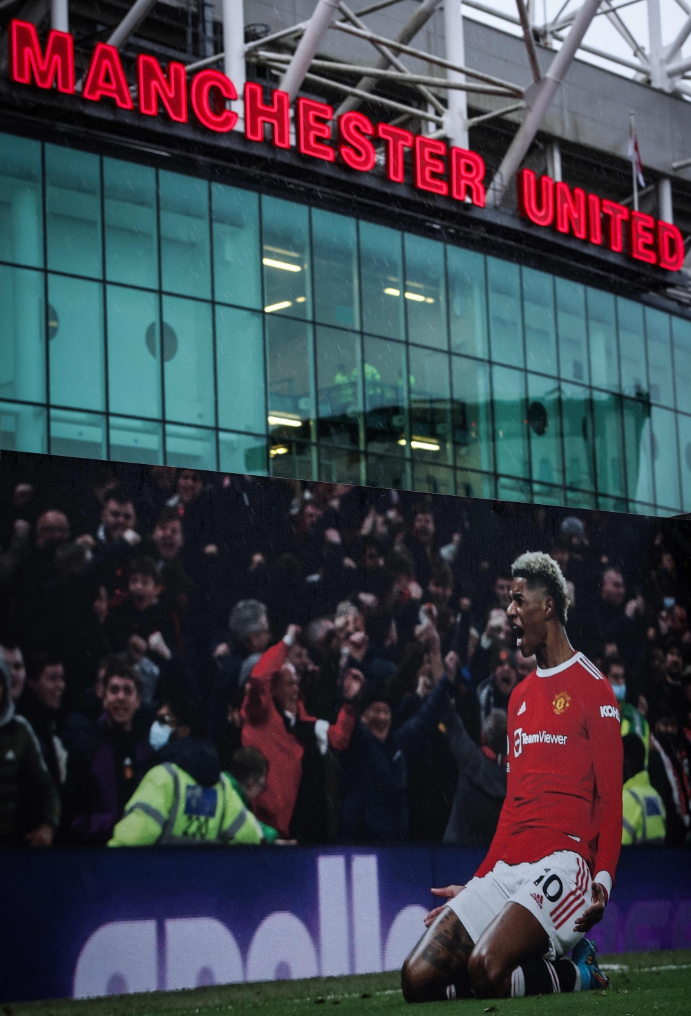 A photograph taken on December 22, 2024 shows a picture of Manchester United's English striker #10 Marcus Rashford celebrating outside Old Trafford in Manchester, north west England, on December 22, 2024 ahead of the English Premier League football match between Manchester United and Bournemouth. — AFP pic