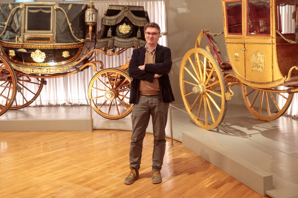 Mario Doeberl, Curator of the Imperial Carriage Castle Museum, poses for a picture in the exhibition hall of the Imperial Carriage Castle Museum (Wagenburg) at the Schoenbrunn Palace in Vienna on December 5, 2024. — AFP pic